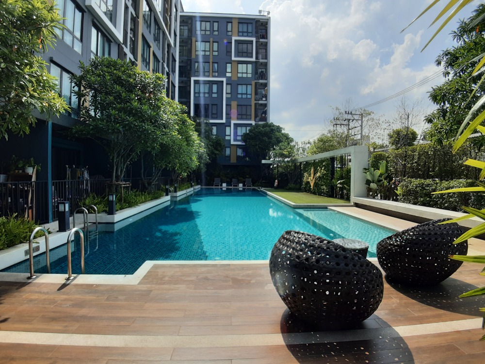 For SaleCondoSeri Thai, Ramkhamhaeng Nida : For Sale with tenant: ICondo Serithai Green Space, Large Room, Pool view, resort style located near NIDA