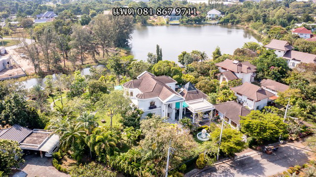 For SaleHouseSriracha Laem Chabang Ban Bueng : Luxury waterfront house for sale in Panya Resort Village, Bang Phra, area 2 rai, natural view, near Crystal Bay Golf Club and Nong Mon Market, near the motorway.