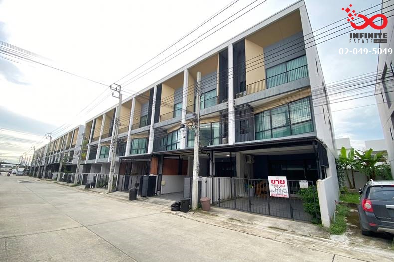 For SaleTownhouseMin Buri, Romklao : 3-story townhome for sale, Nalin Grand Avenue Wongwaen-Rama 9, Kanchanaphisek Road, corner unit.