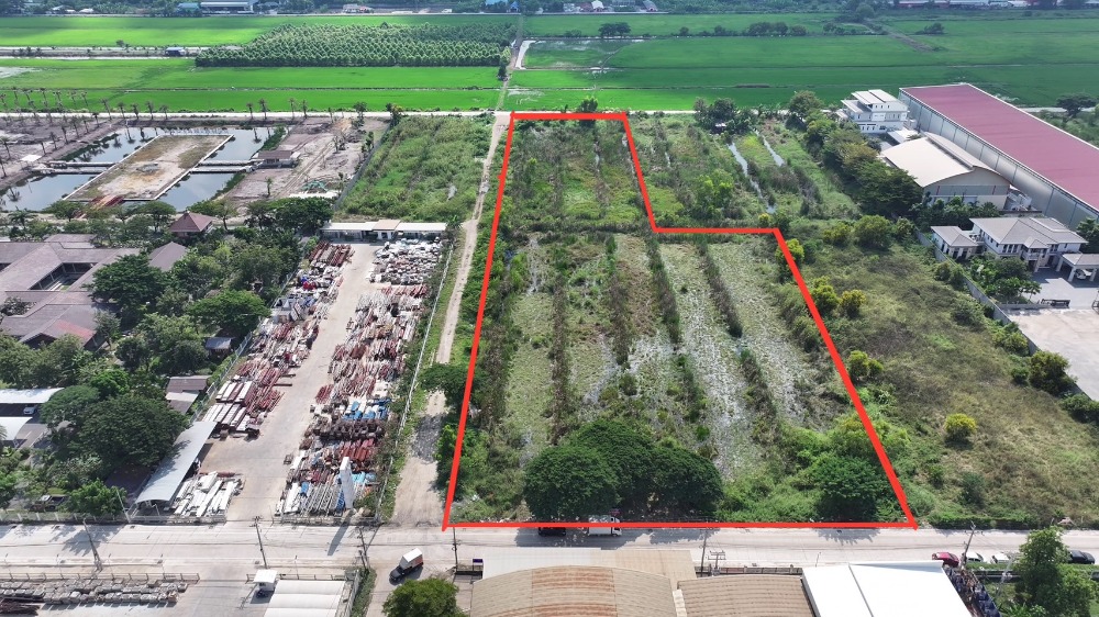 For SaleLandPathum Thani,Rangsit, Thammasat : Empty land for sale, 9 rai, suitable for a factory, warehouse, medium-sized industry, Soi Iyara 5, near Thai Market‼️