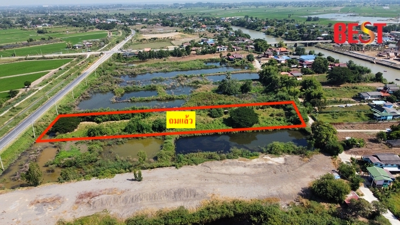 For SaleLandAyutthaya : Empty land for sale, Bang Luang Dot, Bang Ban, Ayutthaya, next to the road on 2 sides, rectangular. Filled in and almost level with the road.