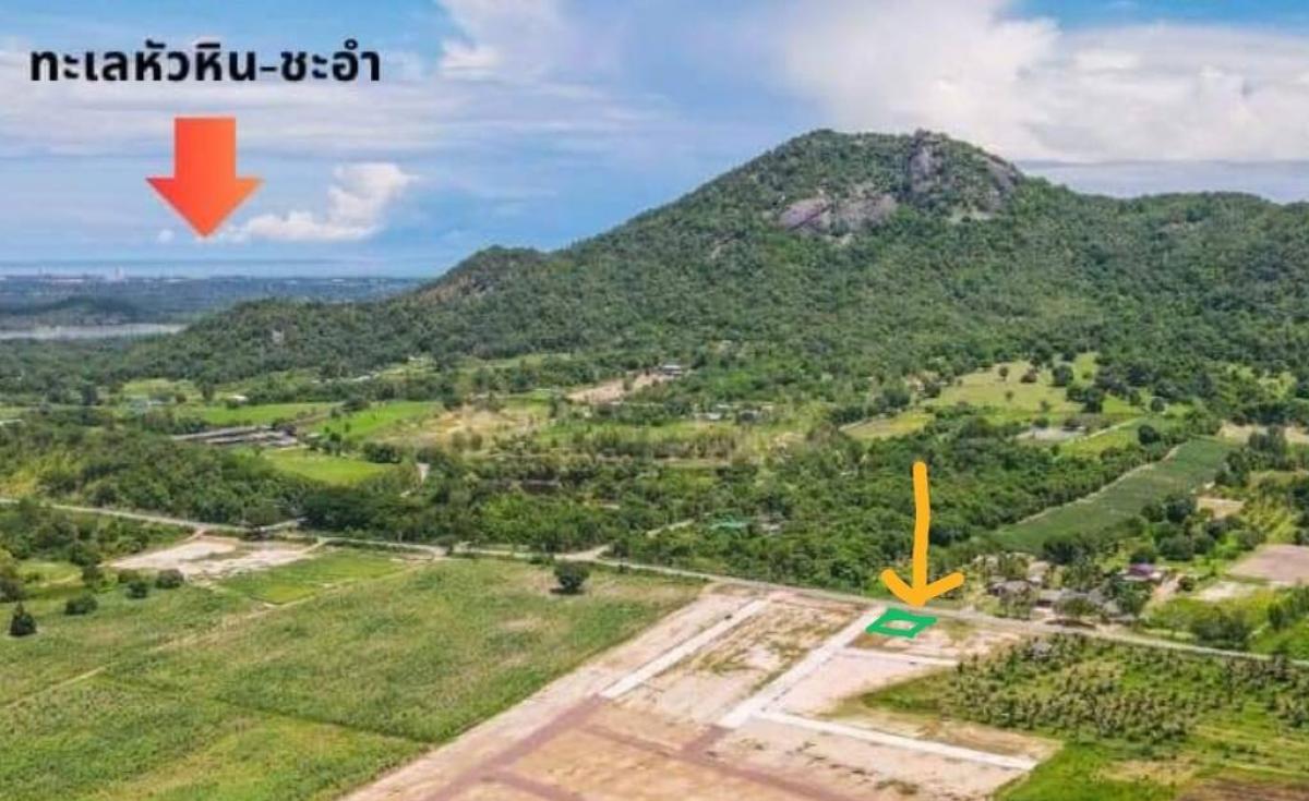 Sale DownLandCha-am Phetchaburi : Cha-am land with title deed, prime location, corner plot, next to paved road, mountain view, 10 minutes from the sea.  Near bypass road, quiet, suitable for building a pool villa. vacation home