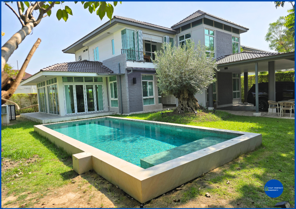 For SaleHouseNawamin, Ramindra : Beautiful, large house with private swimming pool. Very good atmosphere, luxurious built-in, fully decorated, Manthana Lake Watcharapol Village, area 146.8 sq m, 5 bedrooms, 5 bathrooms, good location near the expressway.