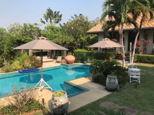 For SaleLandHuahin, Prachuap Khiri Khan, Pran Buri : Single house in Hua Hin, area 1.1.25 rai, beautiful resort style house, 3 houses, price 30.9 million.