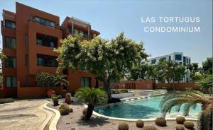 ขายคอนโด : ขายห้องชุดคอนโด ลาส ตอร์ตูกัส คอนโดมิเนียม Las Tortugus Condominium วิวทะเล 2 Bed