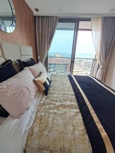 For SaleCondoPattaya, Bangsaen, Chonburi : Condo by Jomtien Beach!!!! Luxurious Five-Star Living in Every Corner, Near Bangkok!! Ultimate Happiness with Truly Accommodating Living, Fully Equipped with Amenities!!!! Easy Rental Release! Selling Copacabana Beach Jo