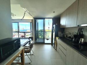 For SaleCondoPattaya, Bangsaen, Chonburi : Sea view 2 bedroom Condo at Unixx South Pattaya close to Phratamnak