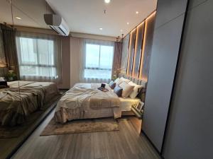 Sale DownCondoOnnut, Udomsuk : Urgent Resale! 1 bedplus room, 44 sq m., very beautiful plan, new building, ready to move in at the end of this year.