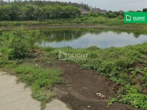 For SaleLandChachoengsao : For sale: vacant land near Wat Phi Khut (Bang Pakong-Chachoengsao), 20 rai on the road, price 74 million baht