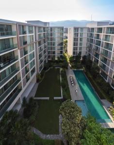 For SaleCondoChiang Mai : For sale with tenant, The Nimmana Condo, 8th floor, mountain view, pool view, spacious and airy room, 4.3 million baht, negotiable. Want to sell quickly. Call 0946511456.