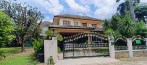 For SaleHousePathum Thani,Rangsit, Thammasat : Cheap sale, large detached house, Parichat Village 345, Pathum 76 sq m, 3 bedrooms, 2 bathrooms, 3.6 million baht.