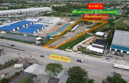 For SaleLandSriracha Laem Chabang Ban Bueng : Selling cheap! Land to build a flea market, Sriracha District, Chonburi Province (Laem Chabang Industrial Estate) on a wide area of ​​4-2-65 rai, next to a 6-lane wide road.