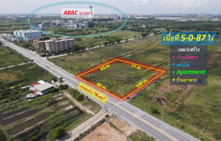 For SaleLandSamut Prakan,Samrong : Land for sale in front of ABAC University, Bangna – Bangna-Trad Road, km. 26 (suitable for building a housing estate + Condo + Apartment + restaurant) 5-0-87 rai, width 80 m., 4-lane road.