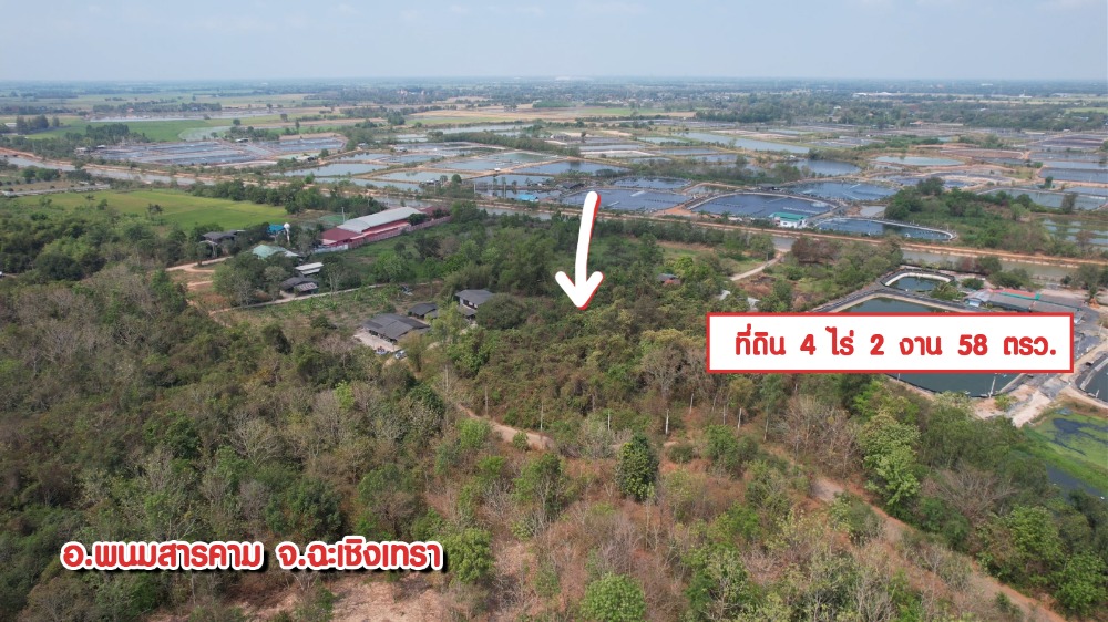 For SaleLandChachoengsao : Land for sale, title deed, 4-2-58 rai, next to the road, with water and electricity, near the community, Phanom Sarakham District, Chachoengsao Province