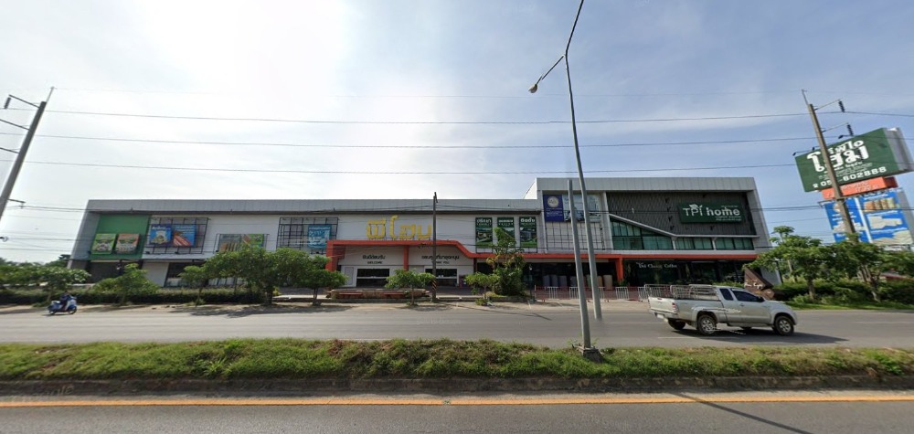 For SaleShowroomChiang Rai : Land for sale with a product showroom-warehouse, on Phahonyothin Road, Huai Khrai Subdistrict, Mae Sai District, Chiang Rai, area 8 rai, selling for 70 million baht.