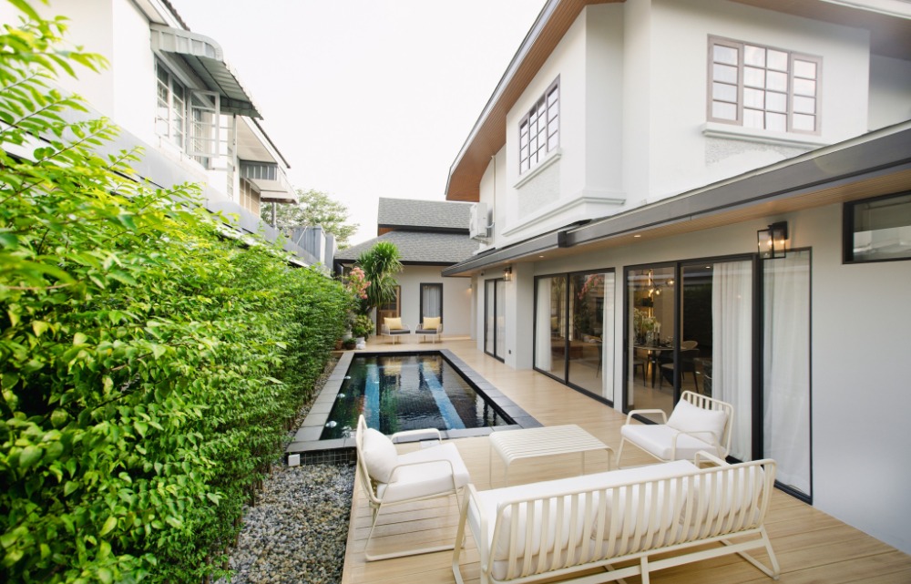 For SaleHouseChiang Mai : Japanese-Style Pool Villa by the Riverside, Only 6 minutes to Ruamchok Mall, Luxurious detached home with a guest house, nestled in nature with total privacy.